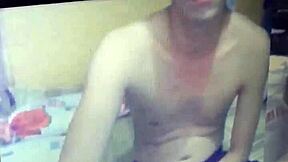 Seductive guy lures cute bro into web chat handjob.