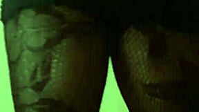 Travesti in black dress showing off style