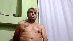 Serbian stud boldly strokes his hard cock in solo action.