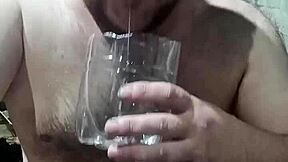Gay savoring the juice dripping from his hard penis
