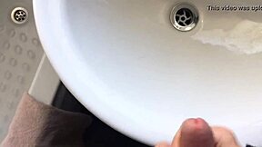 Solo gay twink masturbates and squirts in the bathroom with big cock blowjob