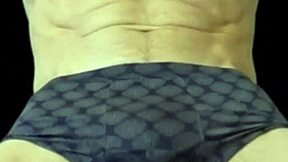 Hot Twink Stretches Tight Shorts on Stool Flexing