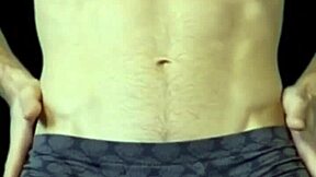 Hot Twink Stretches Tight Shorts on Stool Flexing